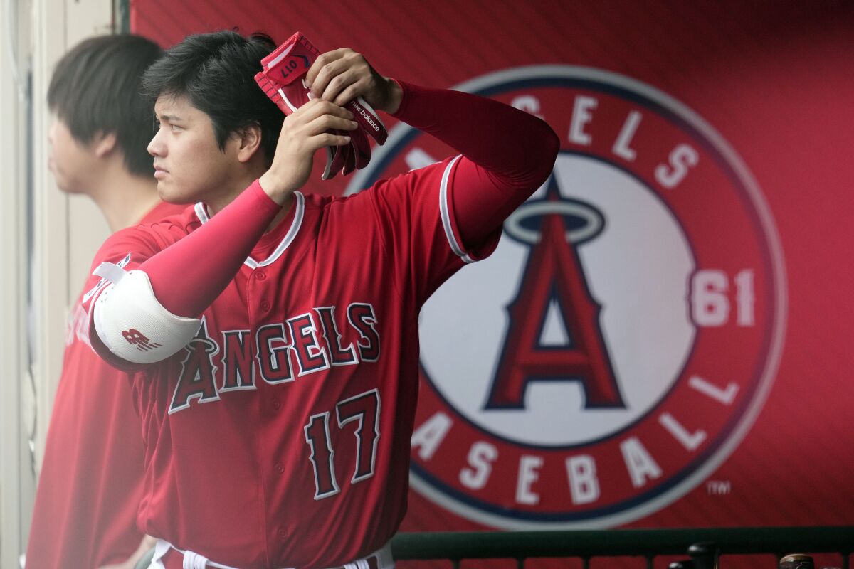 Shohei Otani of the Los Angeles Angels prepares for the fight while in the dugout during the fourth inning.