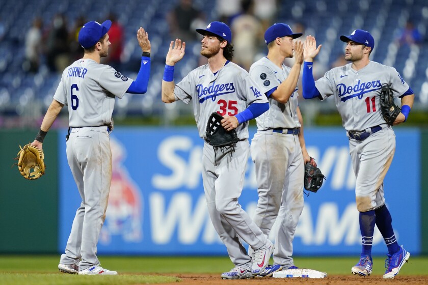 Dodgers' Trea Turner, Cody Bellinger, Corey Seager and AJ Pollock celebrate.