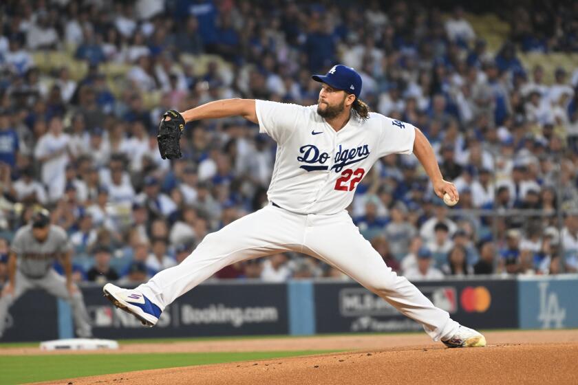 Los Angeles, CA - October 07: Clayton Kershaw delivers a pitch in the first inning of game one of the National League Division Series at Dodgers Stadium on Saturday, Oct. 7, 2023, in Los Angeles, CA. (Wally Skalij / Los Angeles Times)