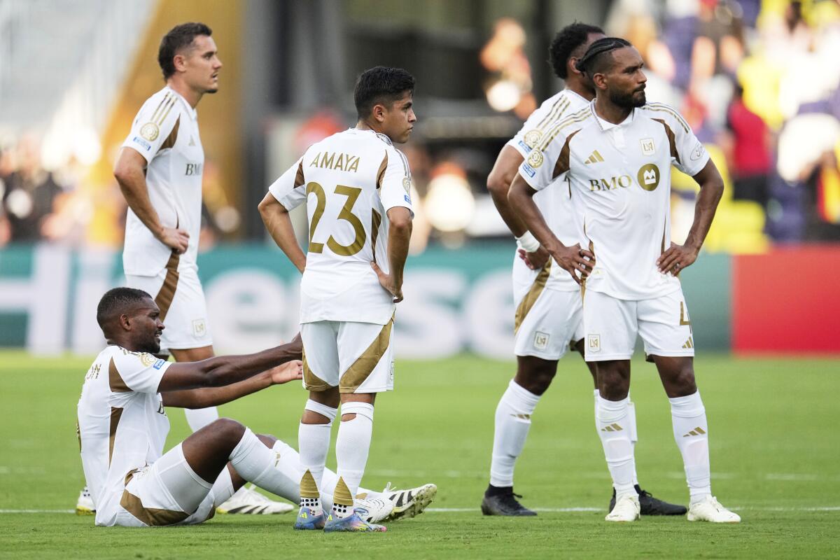 LAFC players react during the Club World Cup Group D soccer match.