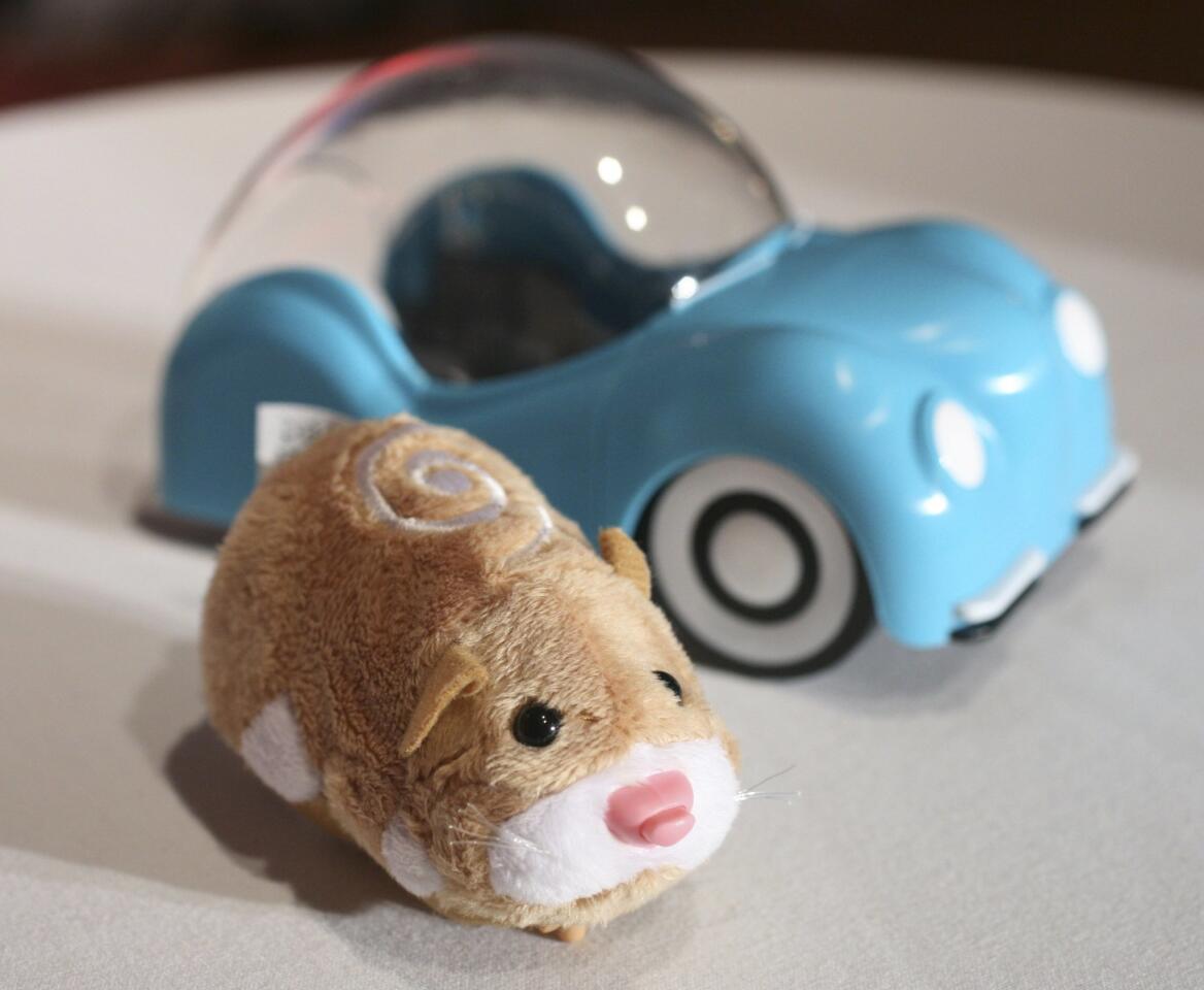 In this Oct. 1, 2009 file photo, a hamster from Zhu Zhu Pets is shown at the Time to Play Holiday 2009 Most Wanted List event in New York. Cepia LLC, the maker of Zhu Zhu Pets, billed the toys as "the best alternatives to real live hamsters" because they "don't poop, die or stink." Stores can't keep them on the shelves. The Chicago Tribune reported people selling the toy, which retailed for $8 to $10, for as much as $95 each.