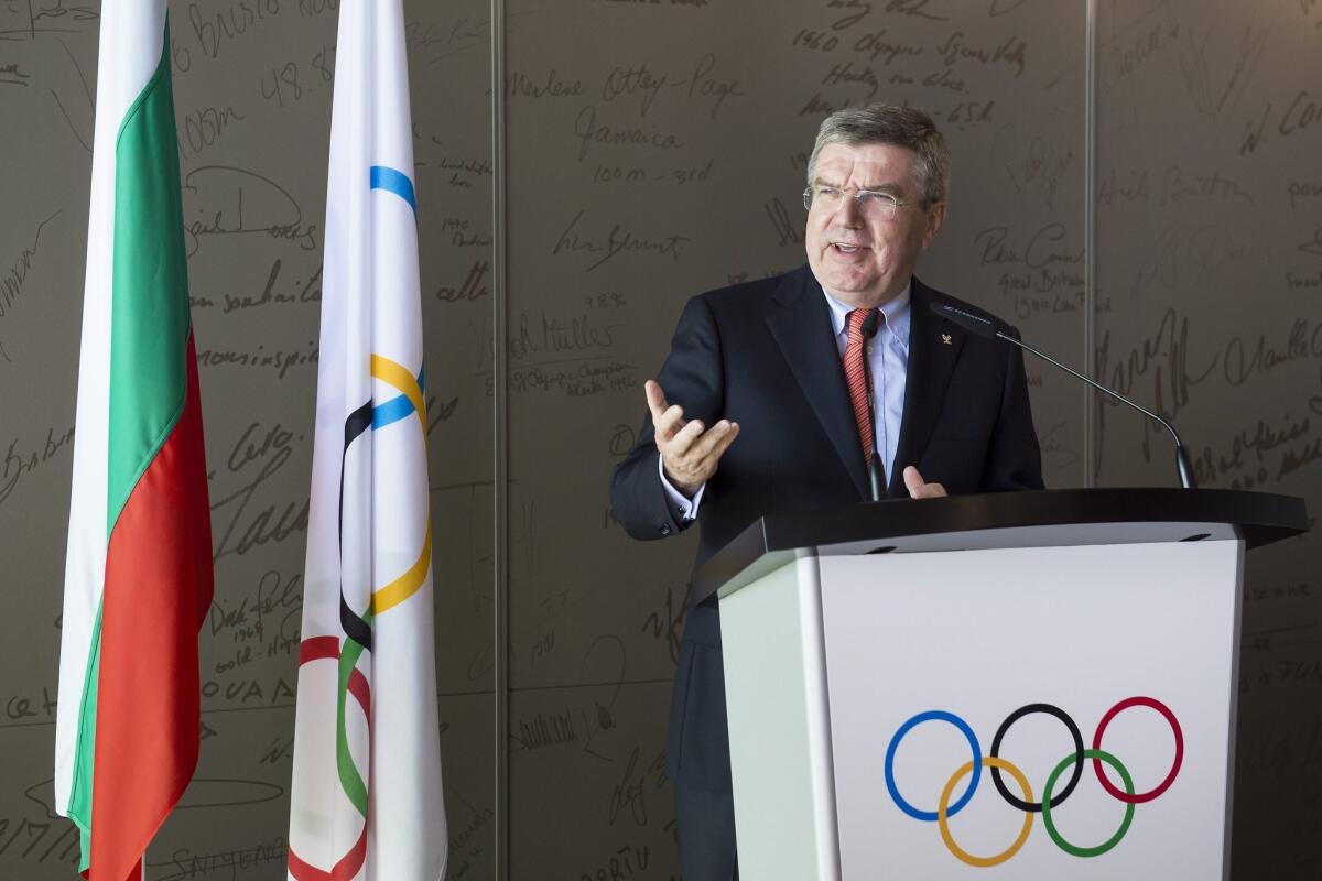IOC president Thomas Bach speaks during a ceremony Oct. 14 to unveil a statue of wrestling at the Olympic Museum in Lausanne, Switzerland.