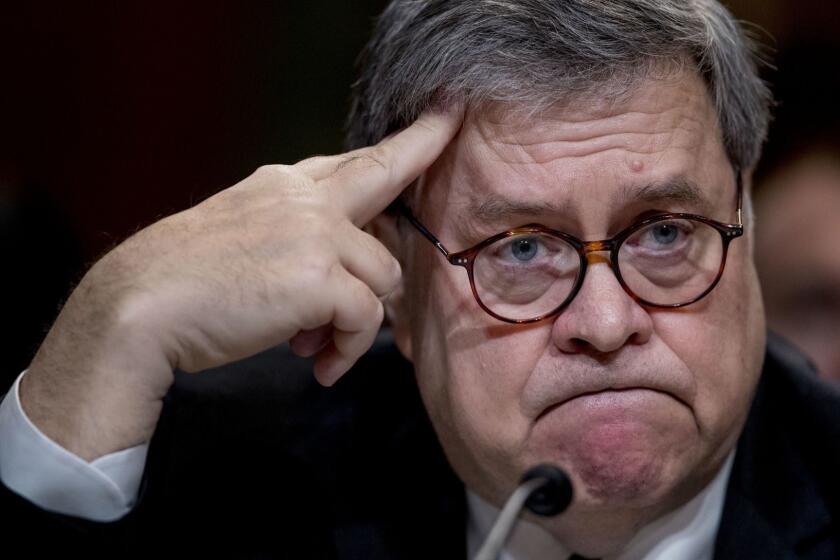 Attorney General William Barr reacts as he appears before a Senate Appropriations subcommittee to make his Justice Department budget request, Wednesday, April 10, 2019, in Washington. Barr said Wednesday that he was reviewing the origins of the Trump-Russia investigation. He said he believed the president's campaign had been spied on and he was concerned about possible abuses of government power. (AP Photo/Andrew Harnik)