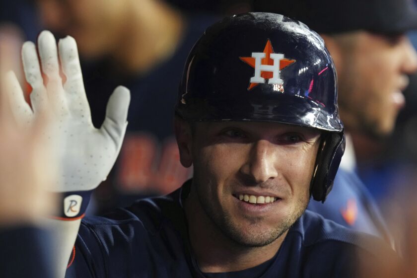 Houston Astros' Alex Bregman celebrates his solo home run against the Toronto Blue Jays during the second inning of a baseball game Thursday, June 8, 2023, in Toronto. (Chris Young/The Canadian Press via AP)