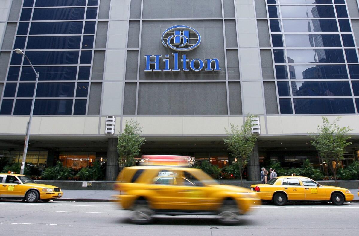Hilton Worldwide plans to raise as much as $2.4 billion in an initial public offering.