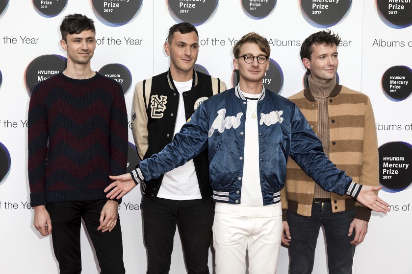 FILE - Members of the group Glass Animals, from left, Edmund Irwin-Singer, Joe Seaward, Dave Bayley and Drew MacFarlane appear at the Mercury Prize 2017 awards in London on Sept. 14, 2017. The band is nominated for a Grammy Award for best new artist. (Photo by Grant Pollard/Invision/AP, File)