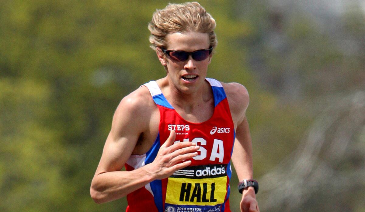 Ryan Hall, shown on Heartbreak Hill during the 2010 Boston Marathon, is the U.S. record-holder in the half marathon at 59:43.