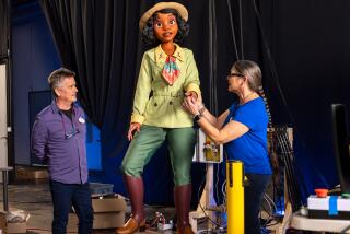 Princess Tiana, in a green explorers outfit, is one of Disney's most lifelike robotics. 