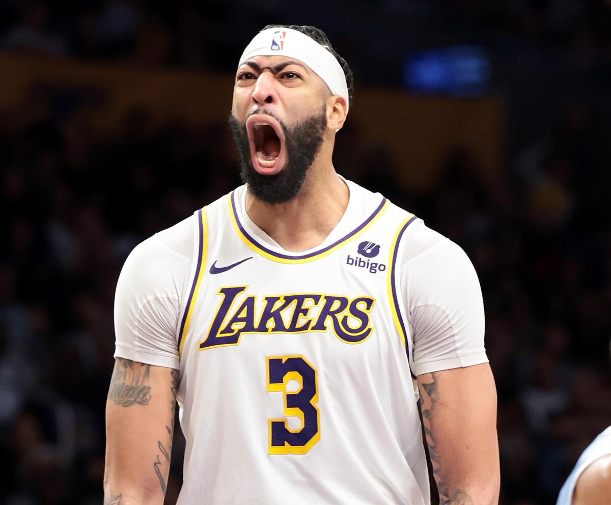 Lakers star Anthony Davis shouts after scoring while being fouled during the fourth quarter of the Lakers' 120-109 win.