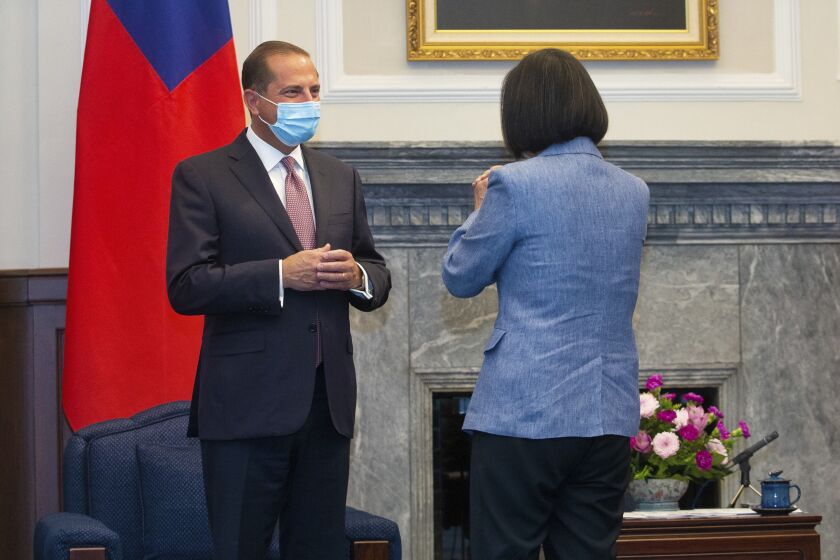 U.S. Health and Human Services Secretary Alex Azar is greeted by Taiwan's President Tsai Ing-wen during a meeting in Taipei, Taiwan on Monday.