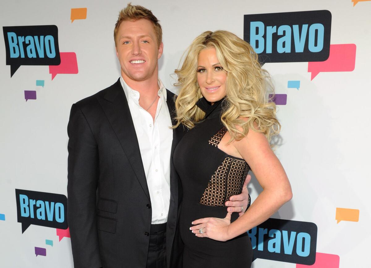 Reality star Kim Zolciak, right, and husband Kroy Biermann of the Atlanta Falcons just welcomed twins.