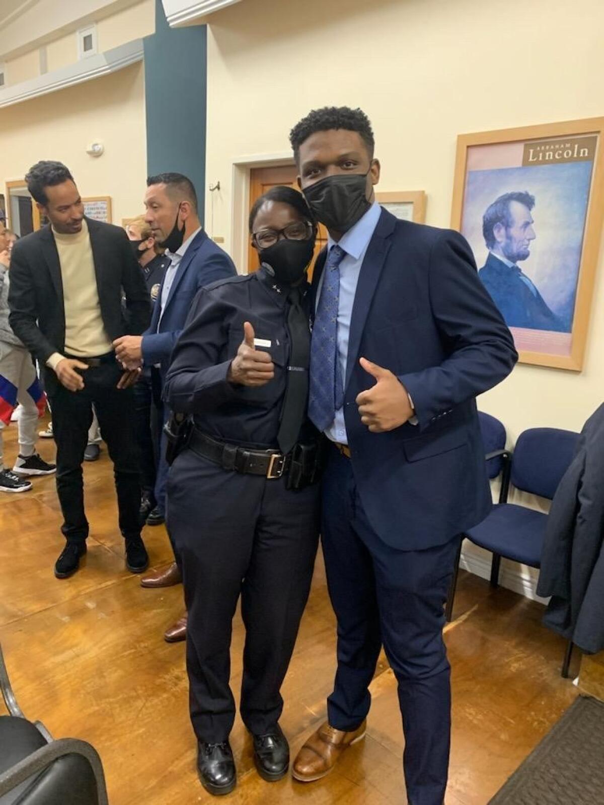 LAPD Deputy Chief Emada Tingirides and Sean Reynolds