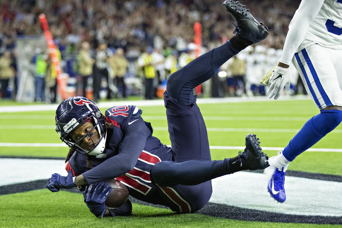 Texans receiver DeAndre Hopkins catches a pass for a touchdown against the Colts on Nov. 21 at NRG Stadium.