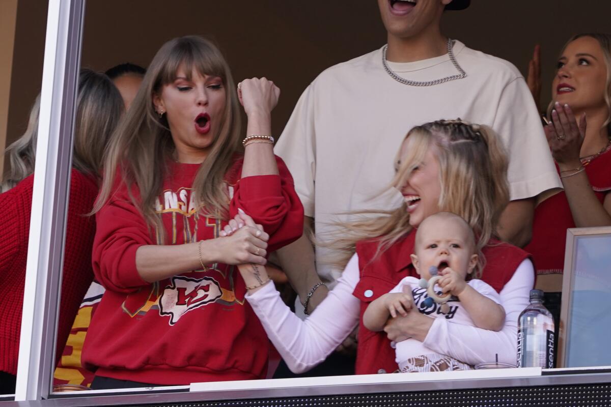 Taylor Swift celebrates with Brittany Mahomes during a game between the Chiefs and Chargers.