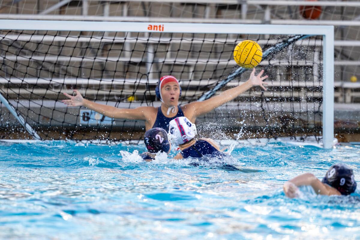 CdM goalkeeper Gabby MacAfee rises up for a save attempt during Saturday's match.