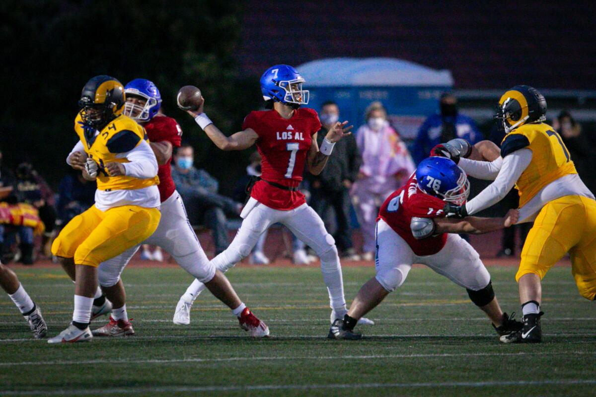 Los Alamitos quarterback Malachi Nelson throws during a 59-0 victory over Millikan on Friday.