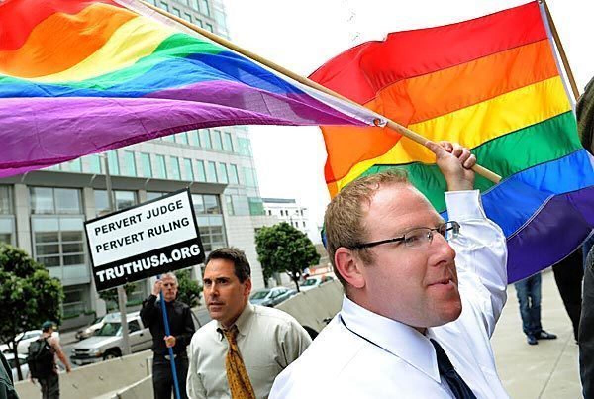 Proposition 8 opponents celebrate outside the Phillip Burton Federal Building in 2010.