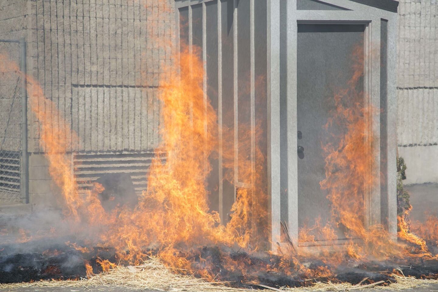 Combustibles were lit on fire around a fire proofed shed to demonstrate it's resistance in the event of a wildfire. A company called "Mighty Fire Breaker" is manufacturing the shed that is fire proof for protecting valuables from wildfire.