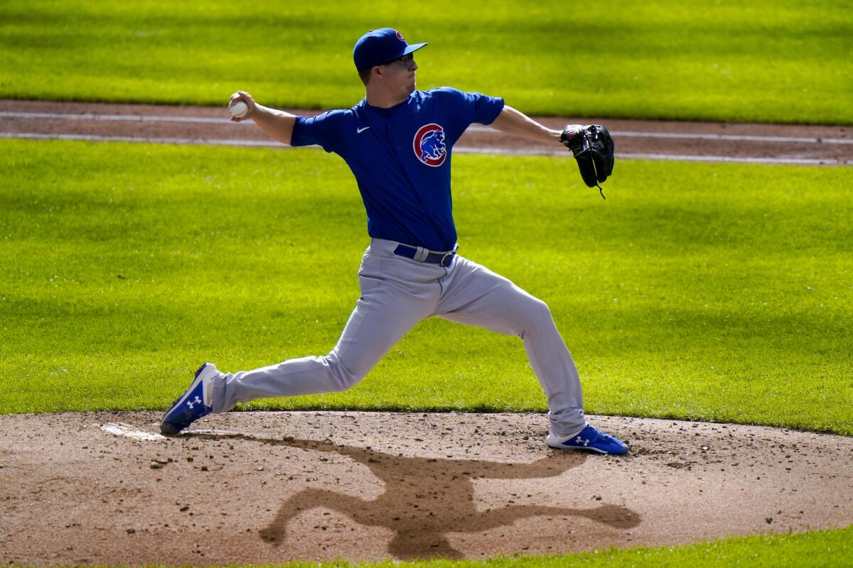 Chicago Cubs starting pitcher Alec Mills throws during the eighth inning against the Milwaukee Brewers on Sunday.