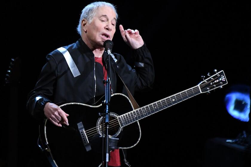 HOLLYWOOD, CALIFORNIA MAY 22, 2018-Paul Simon performs in concert during his farewell tour at the Hollywood Bowl Tuesday. (Wally Skalij/Los Angeles Times)