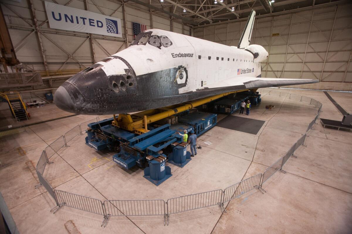 Endeavour inside a United Airlines hangar before its move to the California Science Center in 2012. Jenkins helped with the orbiter's 12-mile journey through the streets of L.A.