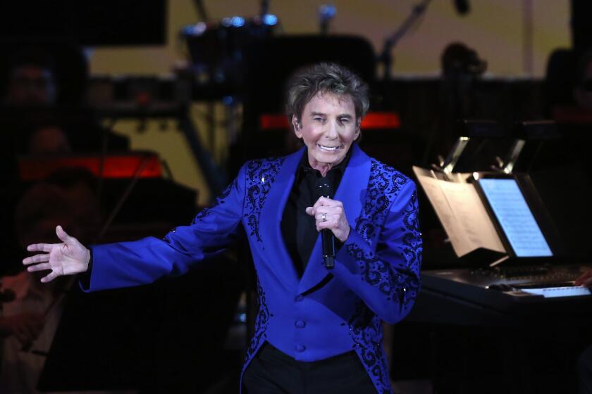 Dania Maxwell  Los Angeles Times THE REVIEW of Barry Manilow’s Hollywood Bowl concert had its detractors.