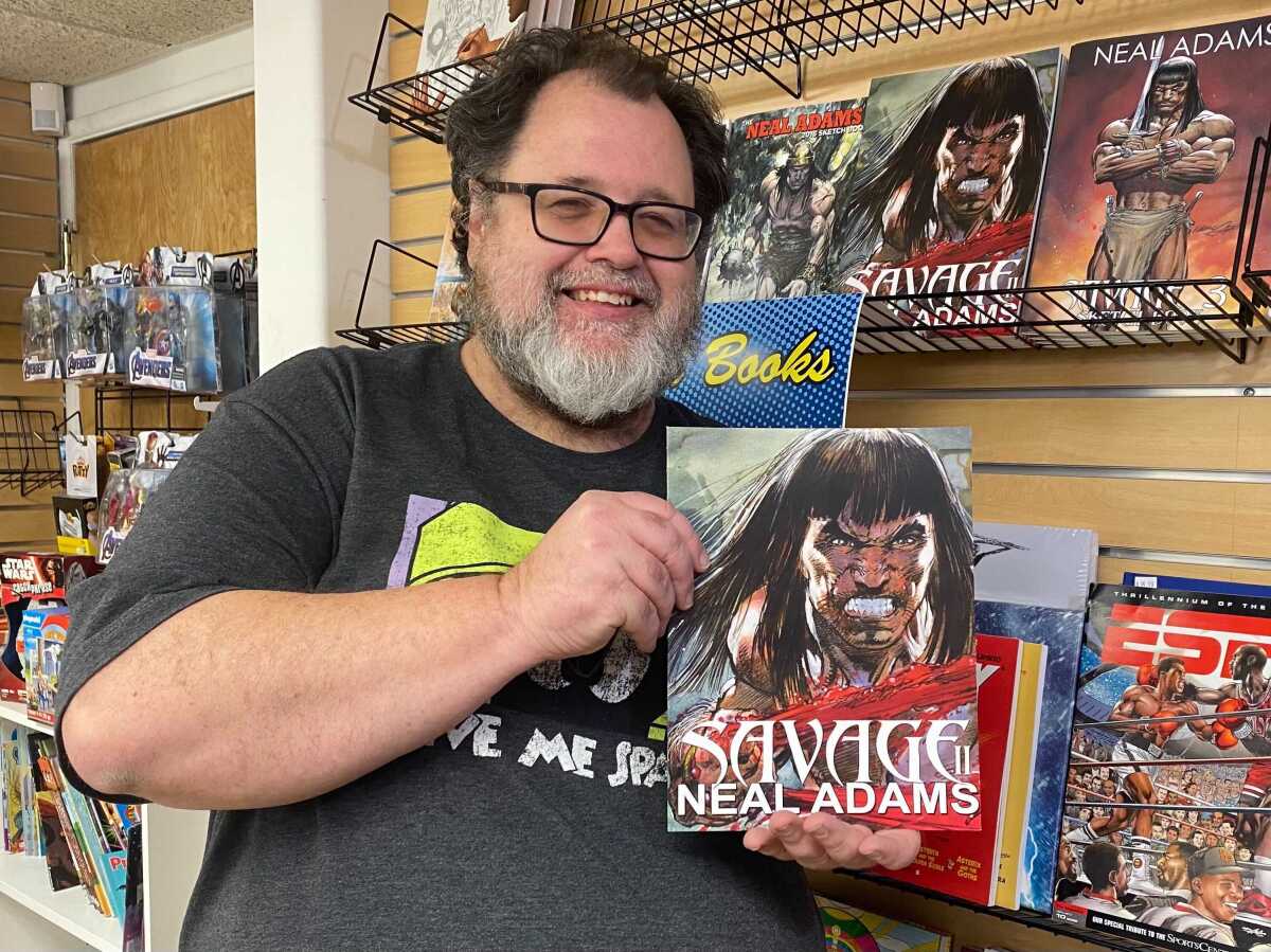 Joel Adams, son of comic book artist Neal Adams, at Neal Adams Crusty Bunkers Comics and Toys in Burbank.