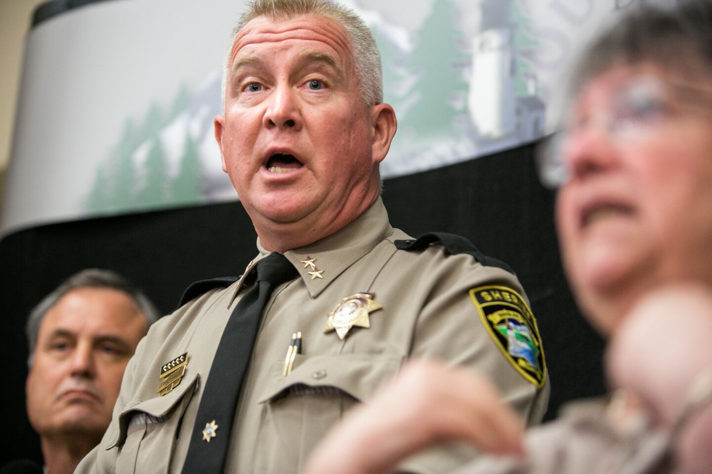 Douglas County Sheriff John Hanlin answers questions on the shooting at a press conference in Roseburg, Ore.