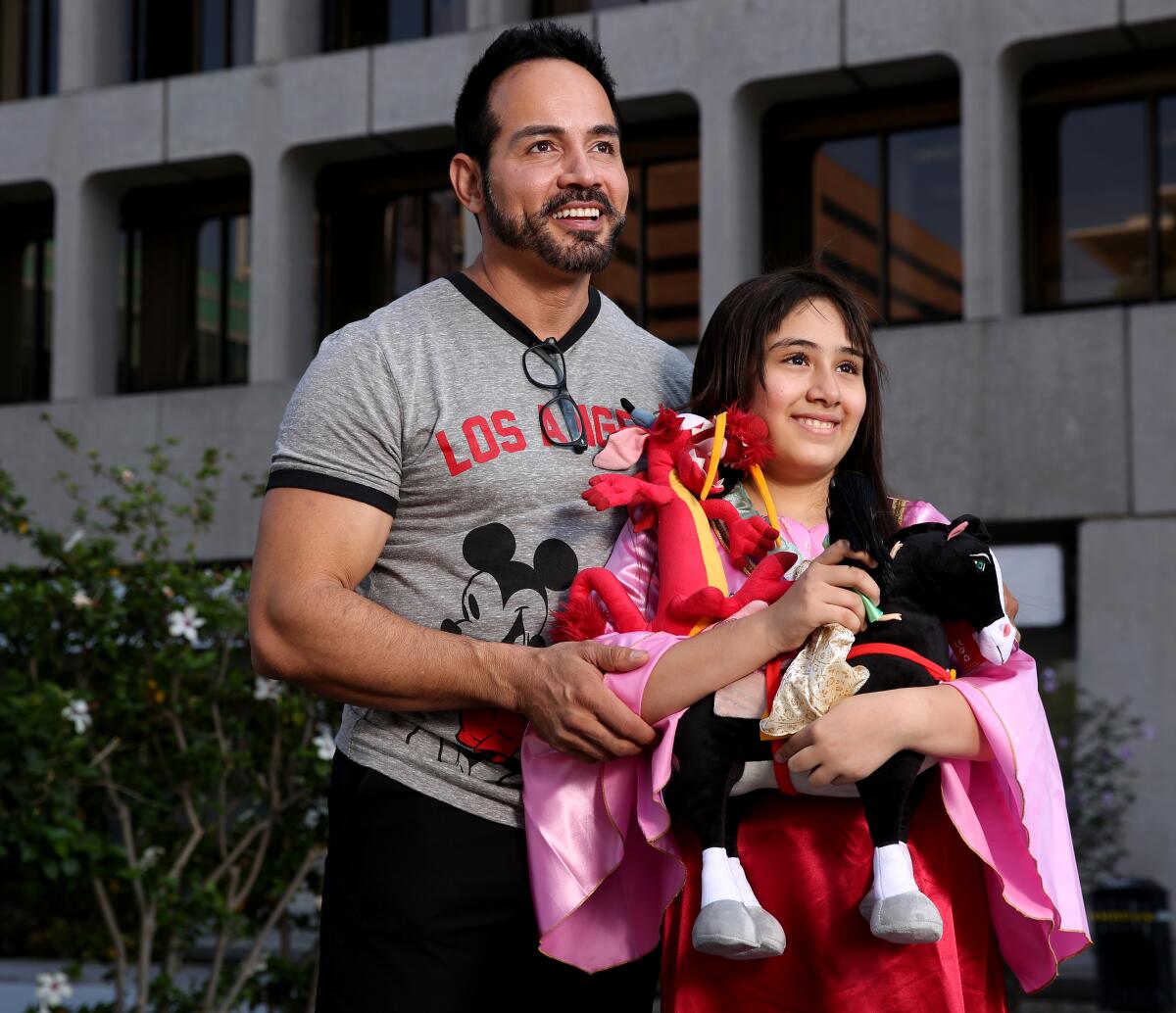 Tony Tirado and his daughter Sofia