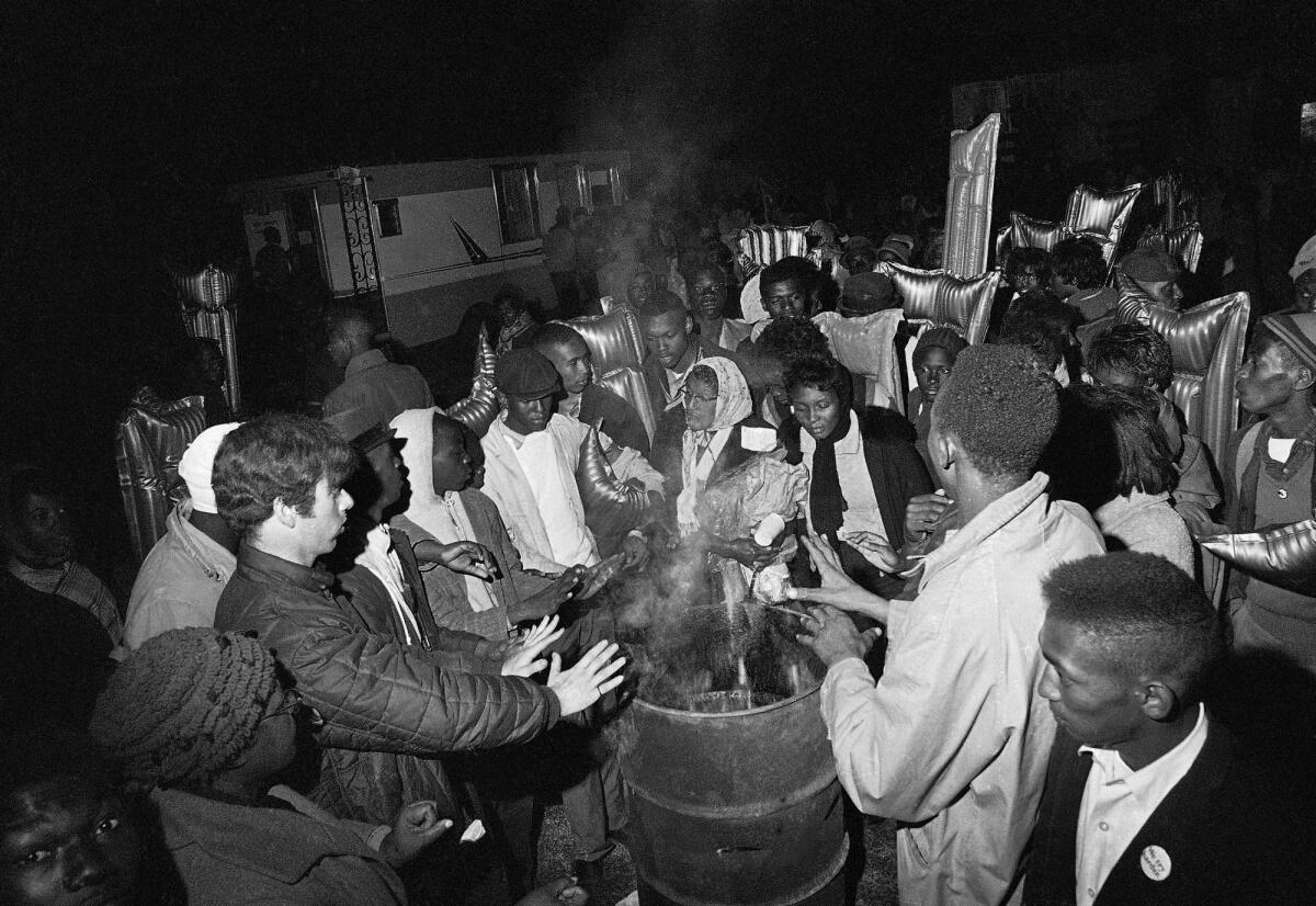FILE - In this March 22, 1965, file photo, participants in the Selma-to-Montgomery voting rights march are shown at a campsite near Selma, Ala. A new assessment released by the National Trust for Historic Preservation in 2021 says four campsites used by marchers nearly 60 years earlier are in danger of being lost without efforts to save them. (AP Photo/File)