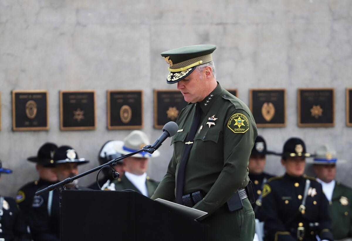 Orange County Sheriff Don Barnes gives the opening remarks at Thursday's ceremony.