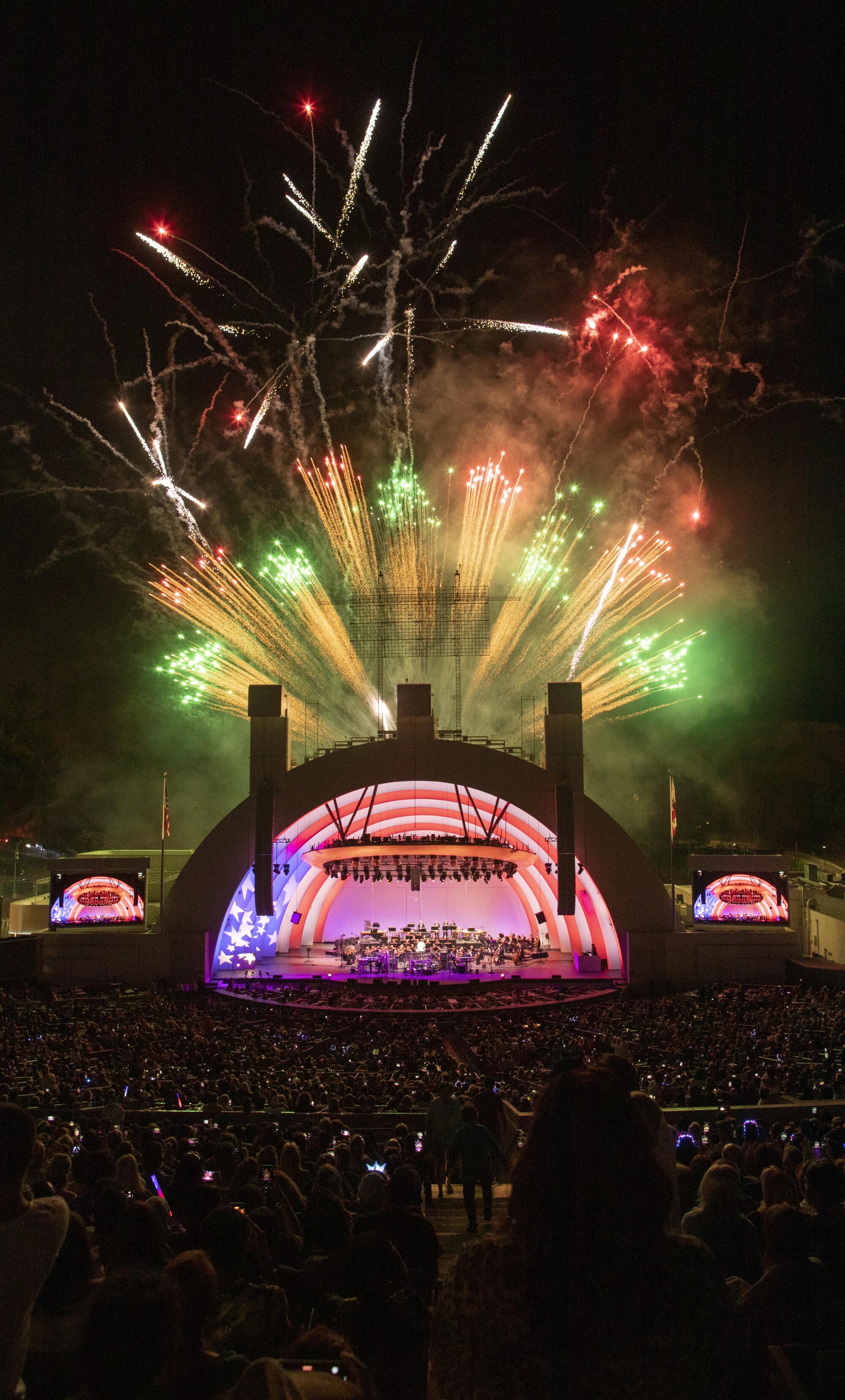 A flag motif in a rainbow shape fills the shell of the Bowl as fireworks explode above.