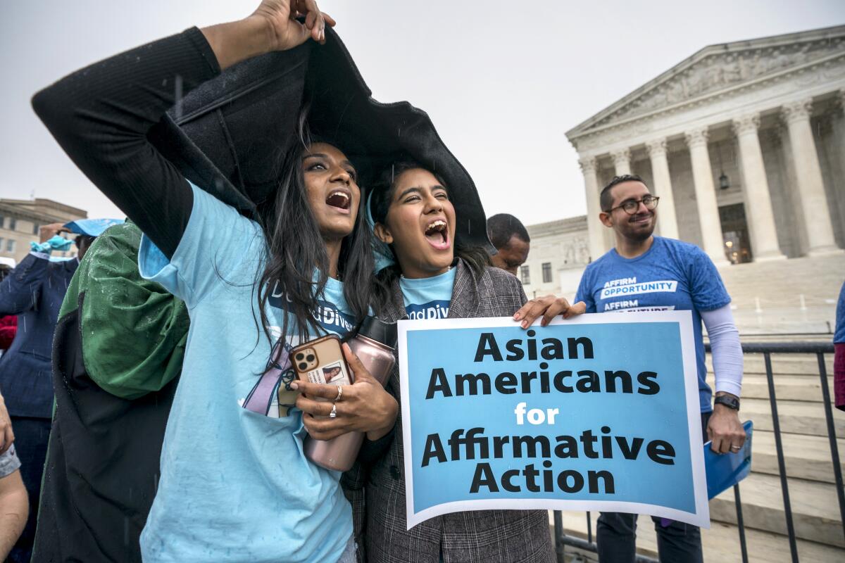 Students near the Supreme Court building in Washington rally in favor of affirmative action