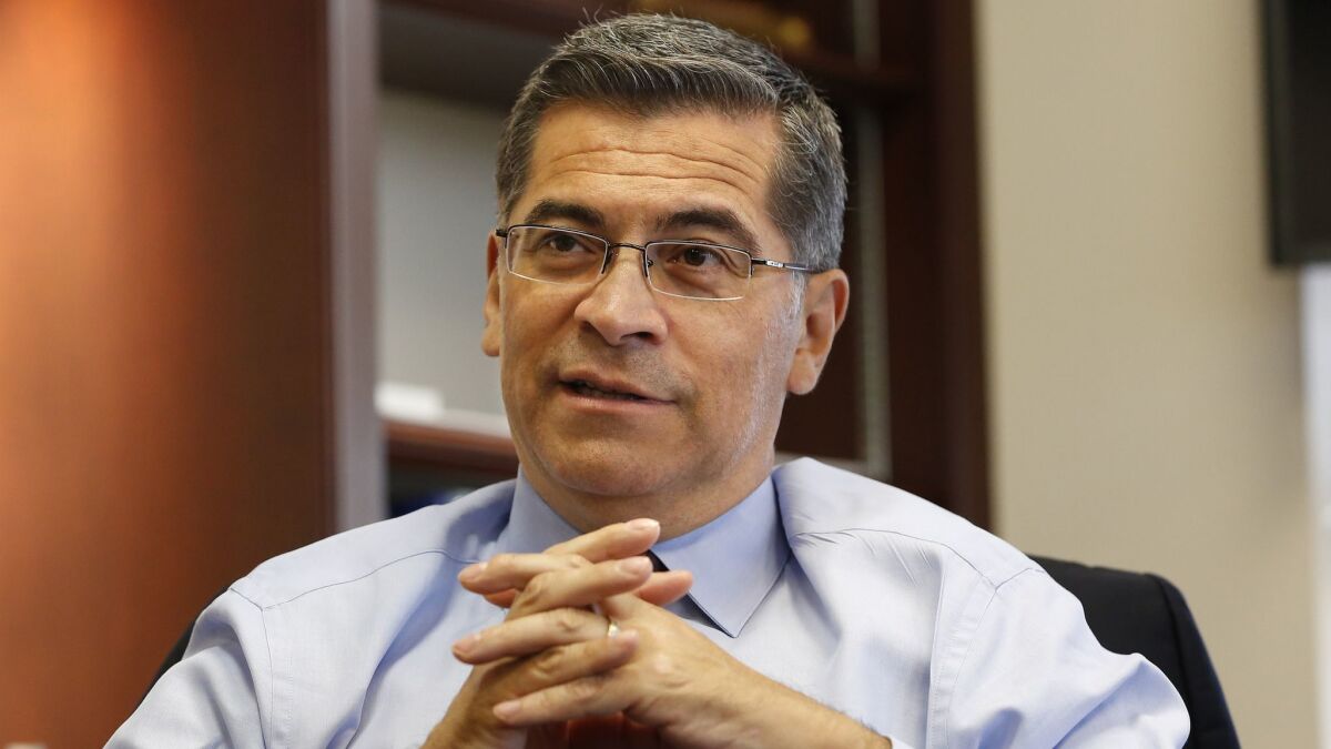 California Attorney General Xavier Becerra sits for an interview in Sacramento, Calif. on Oct. 10, 2018.