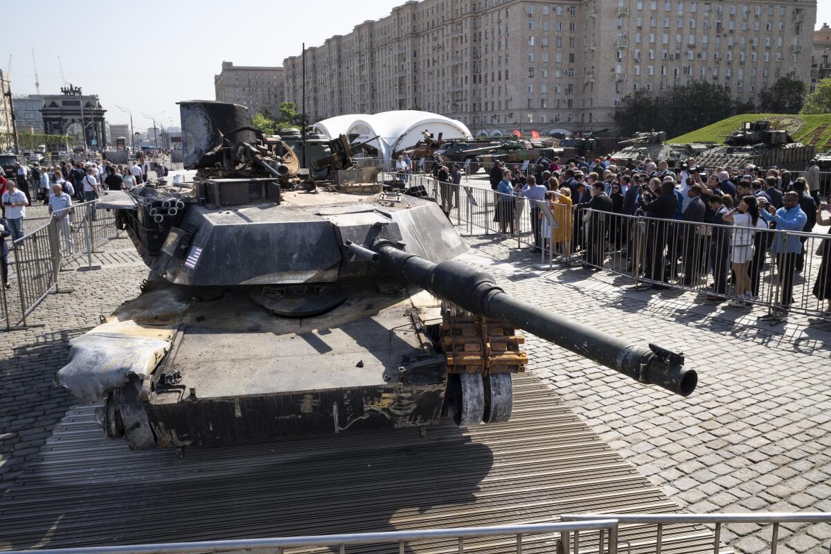 A U.S.-made M1 Abrams tank and other U.S. military vehicles on display in Moscow, seized from Ukraine by Russian forces.