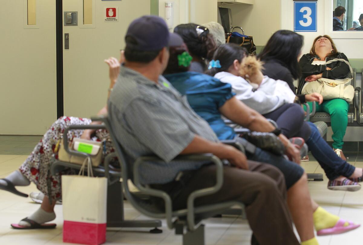 Patients fill an emergency room waiting area for care at Sylmar's Olive View¿UCLA Medical Center in 2012.