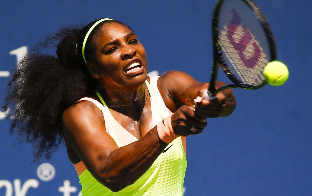 Serena Williams returns a shot against Ana Ivanovic during the quarterfinals of the Western & Southern Open on Friday.