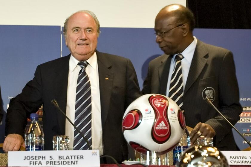 Jack Warner, right, says he has documents and checks that link FIFA officials, including embattled President Sepp Blatter, left, to the 2010 election in Trinidad and Tobago.