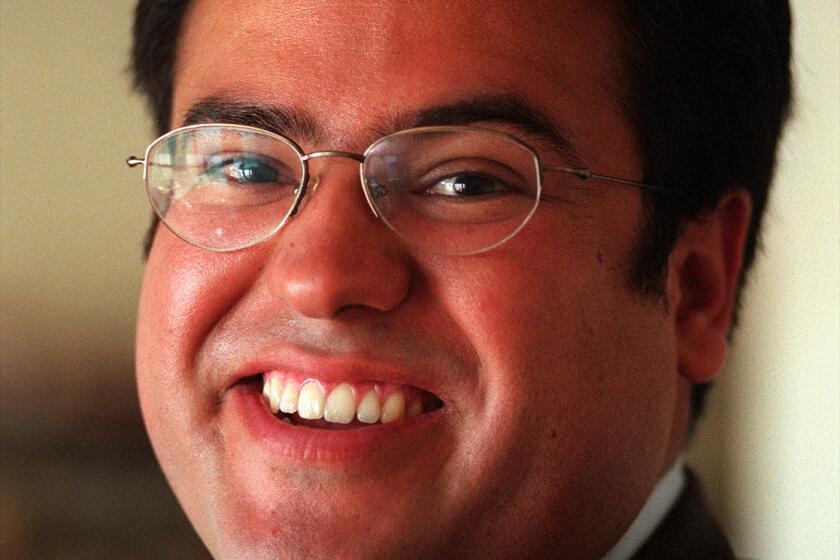 VE.rodriguez.2.1008.AW. Pepperdine scholar Gregory Rodriguez at his home office in Los Angeles. Photo shot 10/8/99