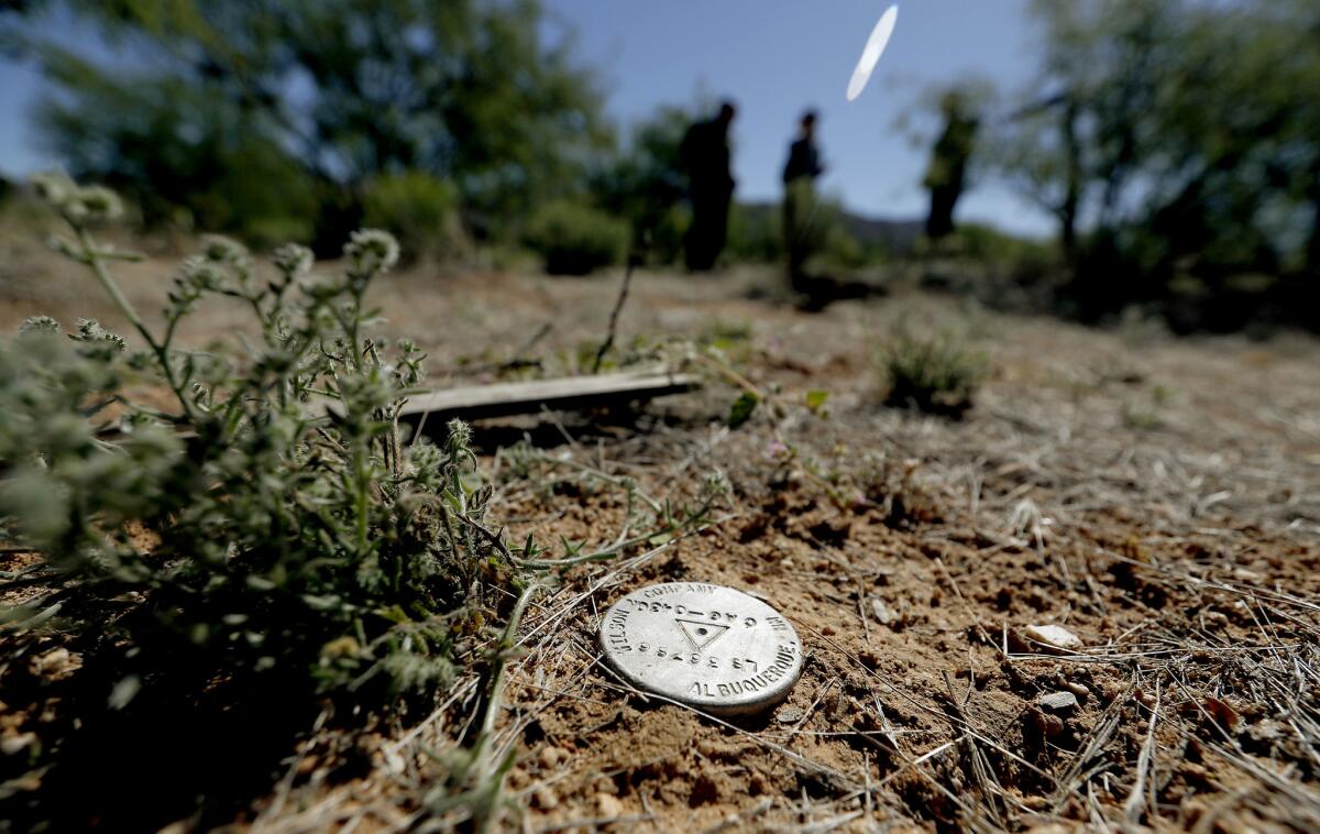 A surveyors marker shows the future location of a Border Patrol surveillance tower in the Tohono O'odham Nation along the U.S.-Mexico border in Arizona. (Luis Sinco / Los Angeles Times)