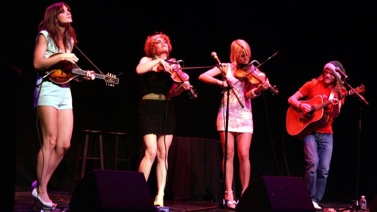 Lillie Mae, second from left, in a 2008 performance with her family band, Jypsi, and siblings, from left, Scarlett, Amber Dawn and Frank.