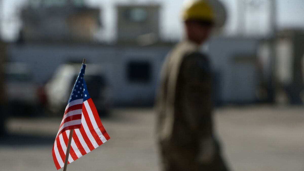 In this 2014 photo, a U.S. flag is pictured at Bagram Air Base north of Kabul, near where U.S. forces say three U.S. soldiers and a contractor were killed on Monday April 8, 2019.