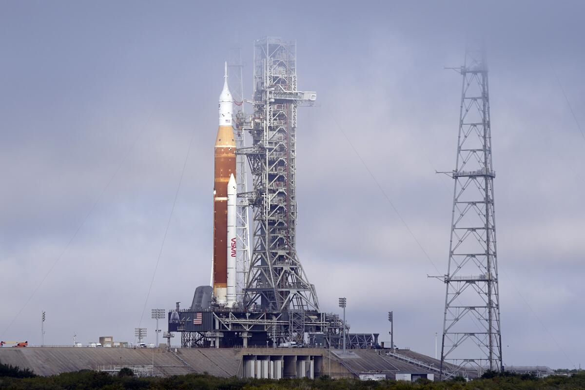 NASA's Artemis rocket with the Orion spacecraft aboard stands on pad 39B at the Kennedy Space Center in Cape Canaveral, Fla. 