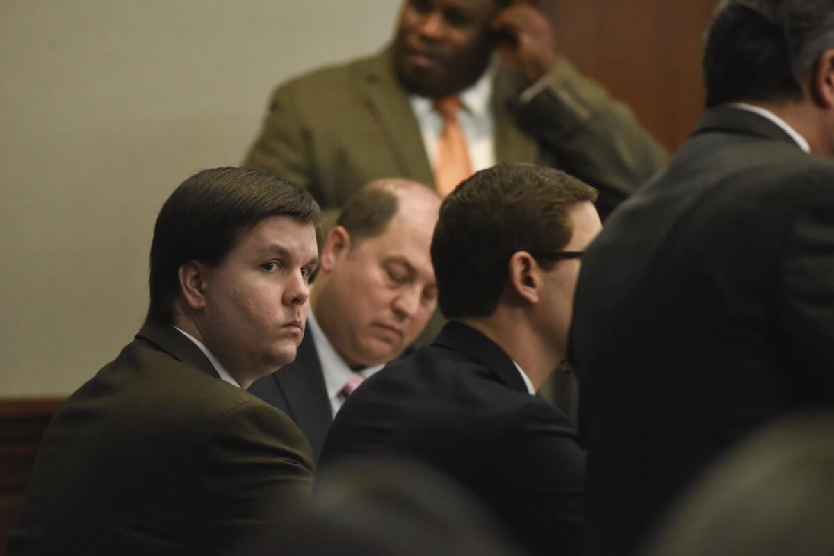 Justin Ross Harris, left, sits with his defense team in the Glynn County Courthouse in Brunswick, Ga. on Nov. 14.