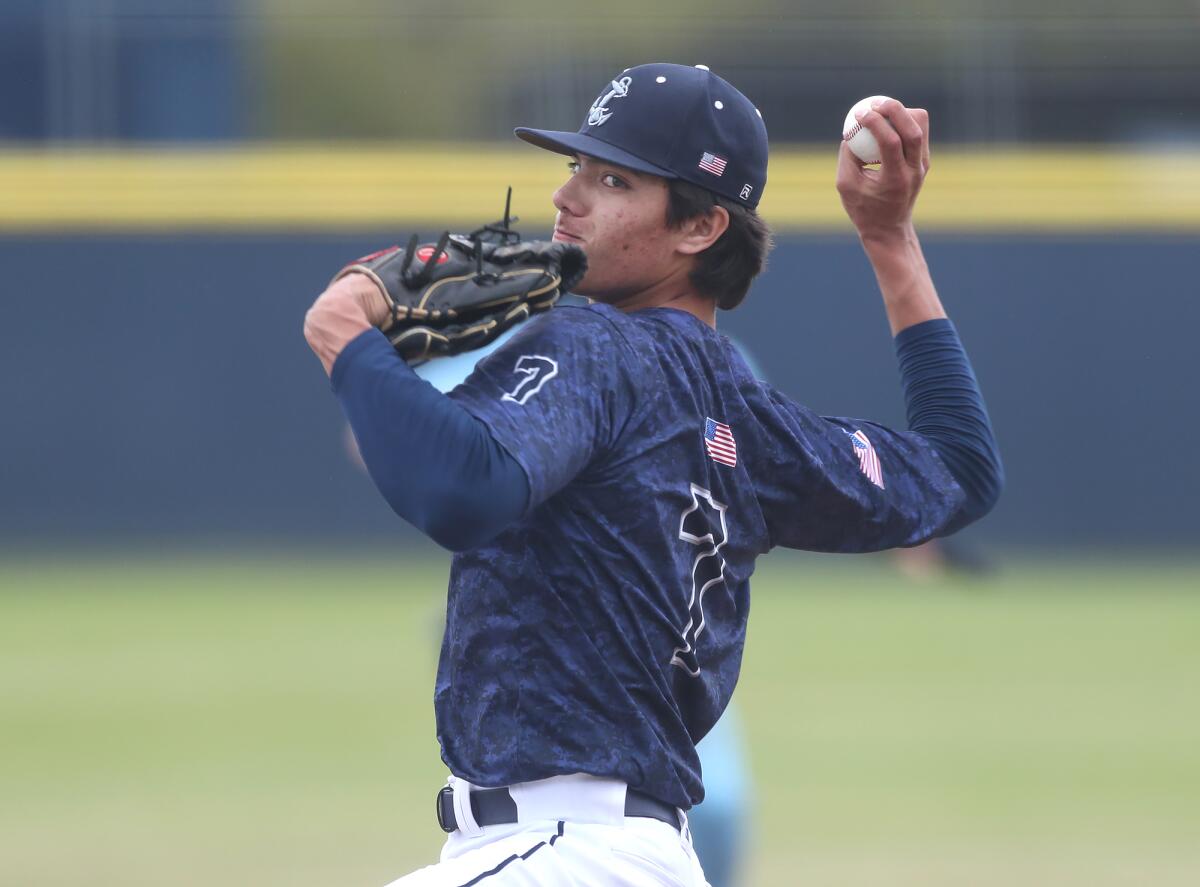 Newport Harbor starting pitcher Dominic Viglione throws a strike against Corona del Mar on Friday.