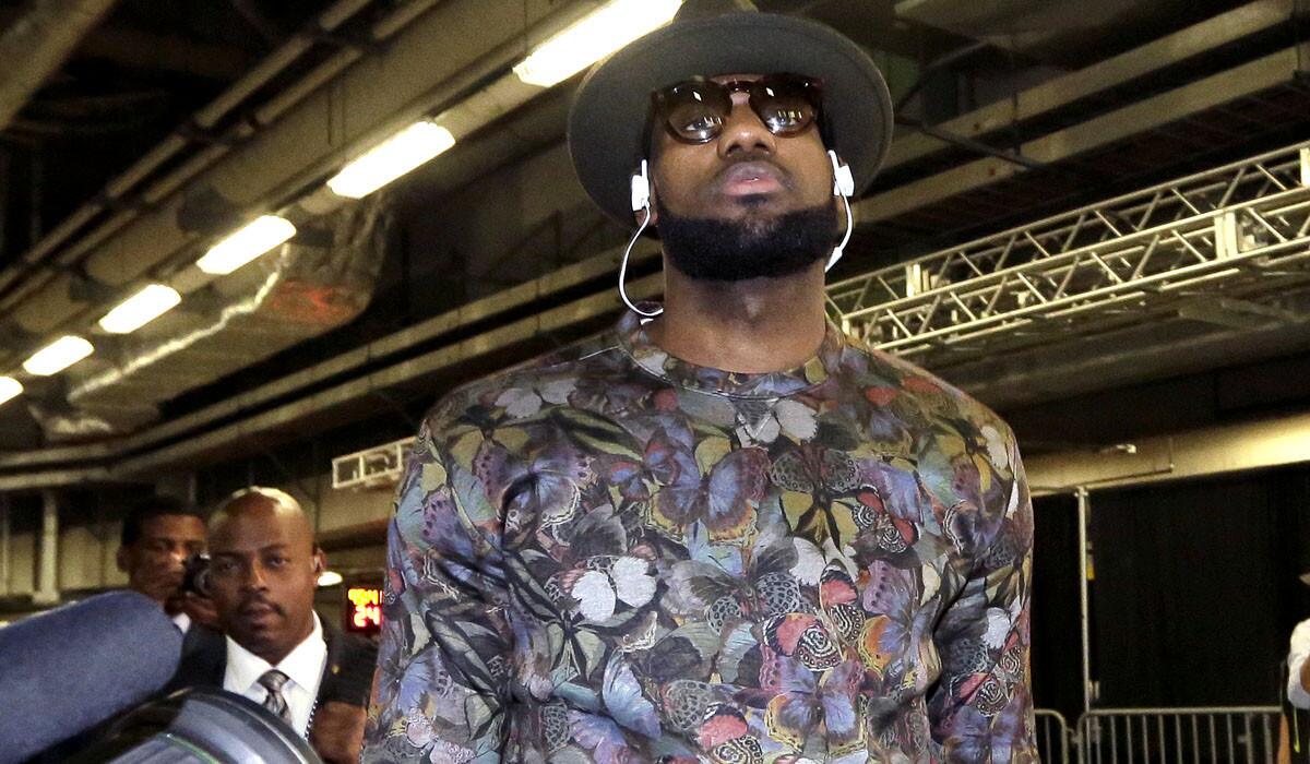 Cleveland Cavaliers forward LeBron James arrives for the Christmas Day game against the Heat in Miami.