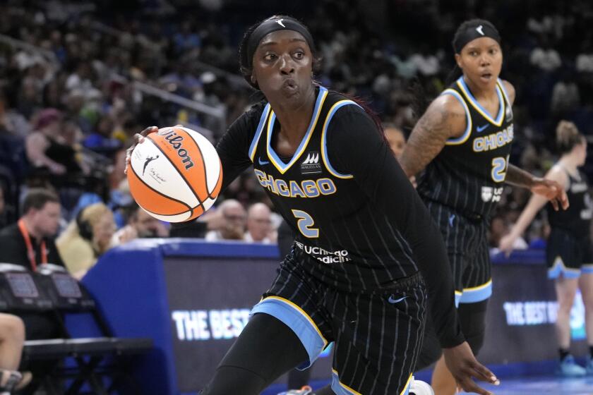 Chicago Sky's Kahleah Copper drives to the basket during a WNBA basketball game.