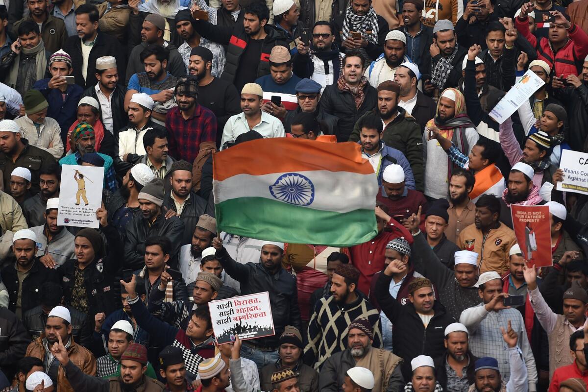 A protest against India's new citizenship law is held near New Delhi's Jama Masijd, one of India's largest mosques, on Friday.
