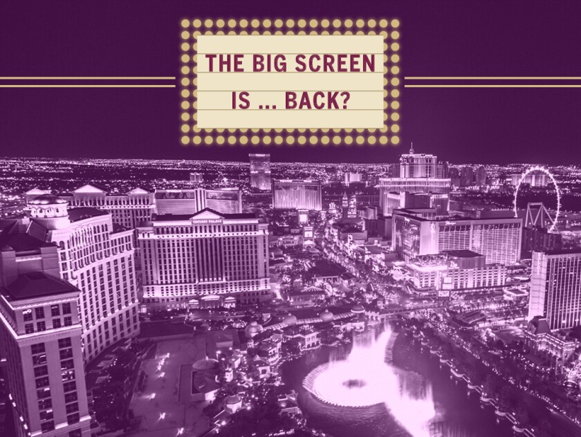 overhead view of the Las Vegas strip, along with a marquee sign that reads, "The big screen is ... back?"