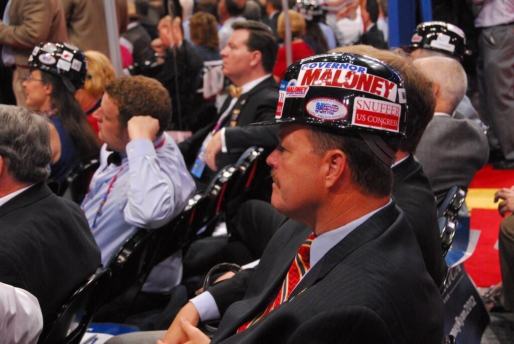 Kris Warner, of Morgantown, West Virginia, listens to a speech at the RNC in Tampa.